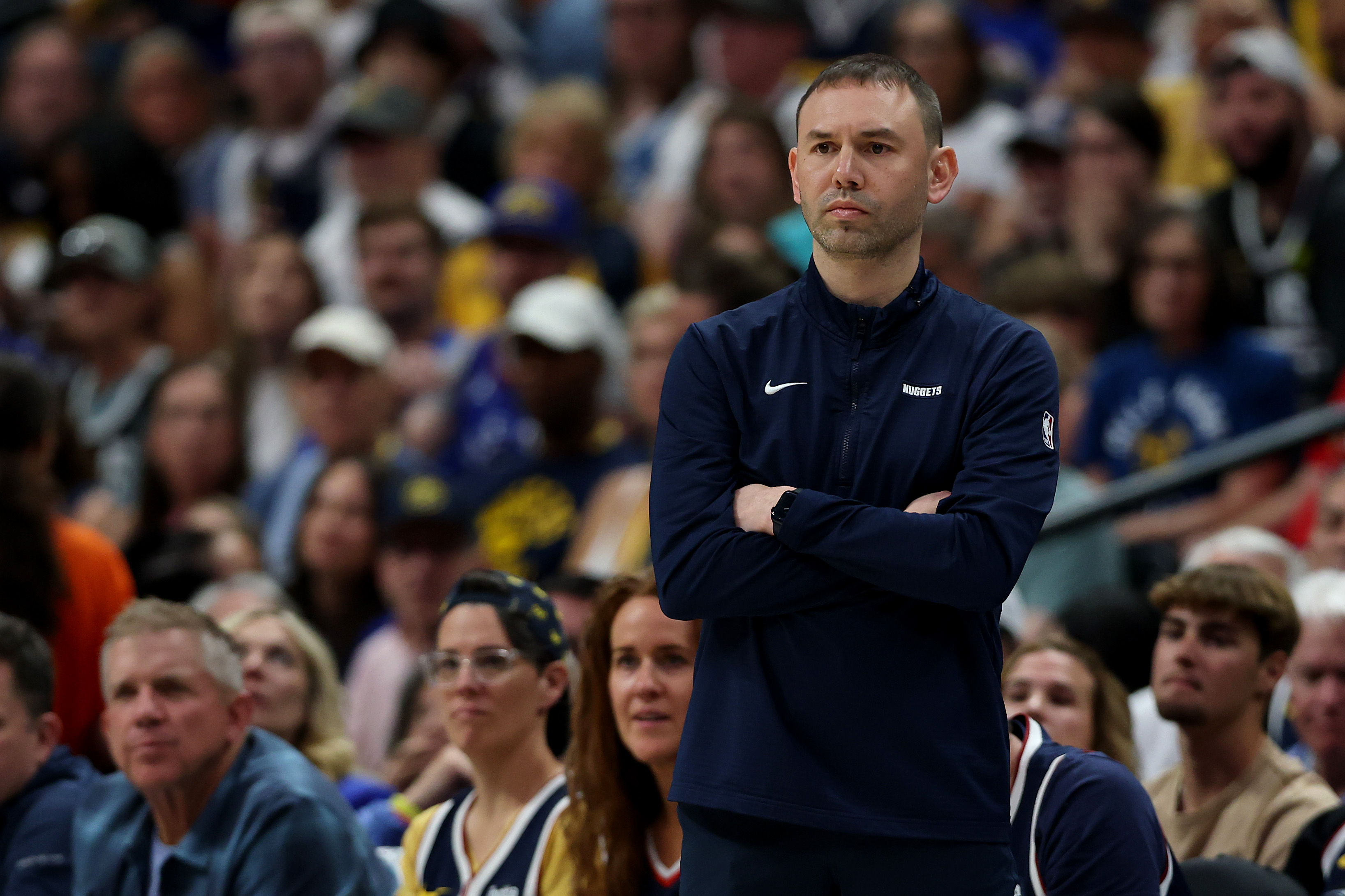 The Denver Nuggets show their support for interim head coach David Adelman after their Game 7 defeat against the Oklahoma City Thunder